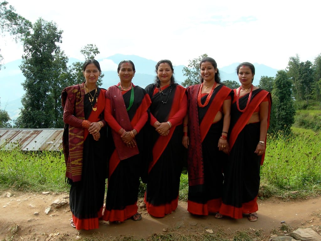 Five women in sarees, from the Newar people, a Tibeto-Burman ethnic group that primarily inhabits in Nepal's Kathmandu Valley
