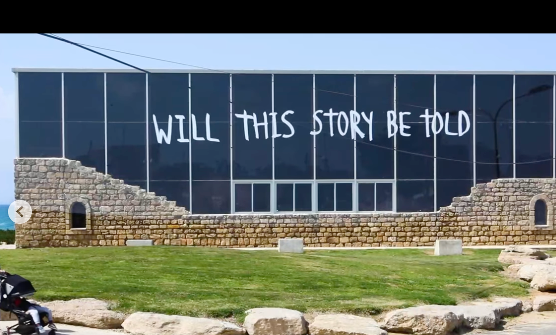 same building as the last image, now written, "will this story be told" 